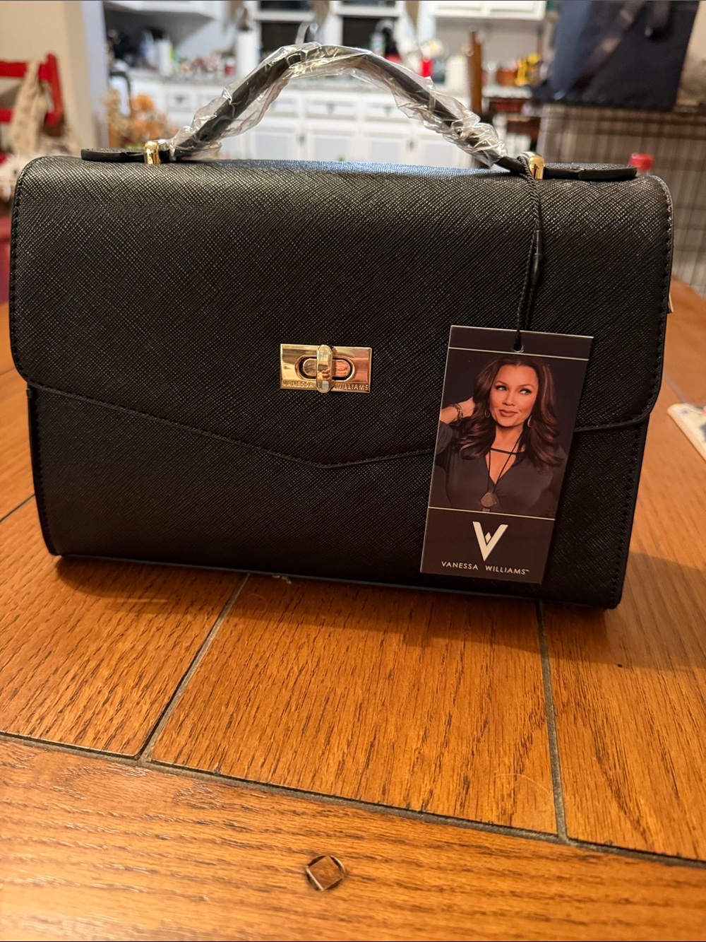 Structured Black Top-Handle Women's Bag with Gold Twist Lock
